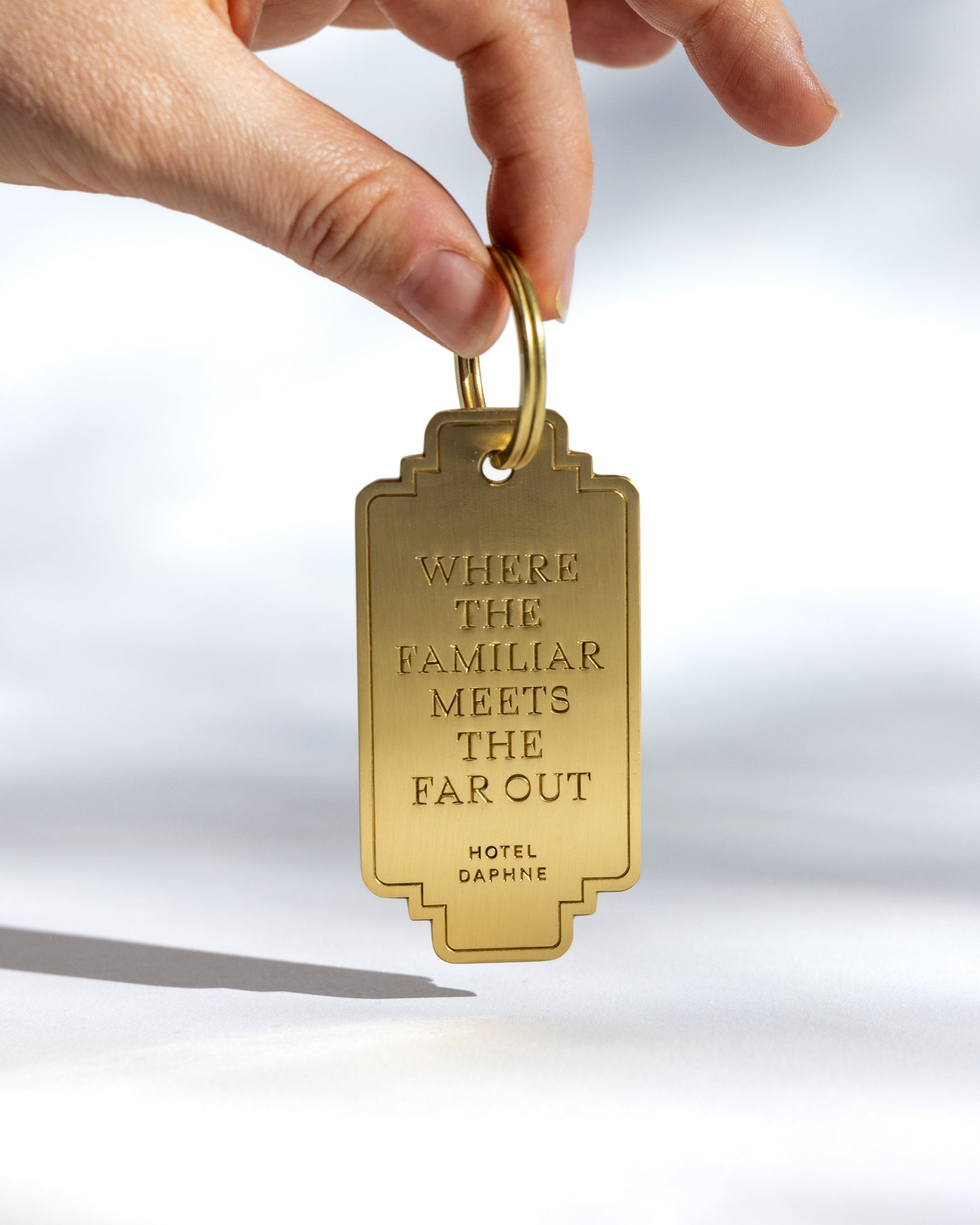 Hotel Daphne Brass Keychain